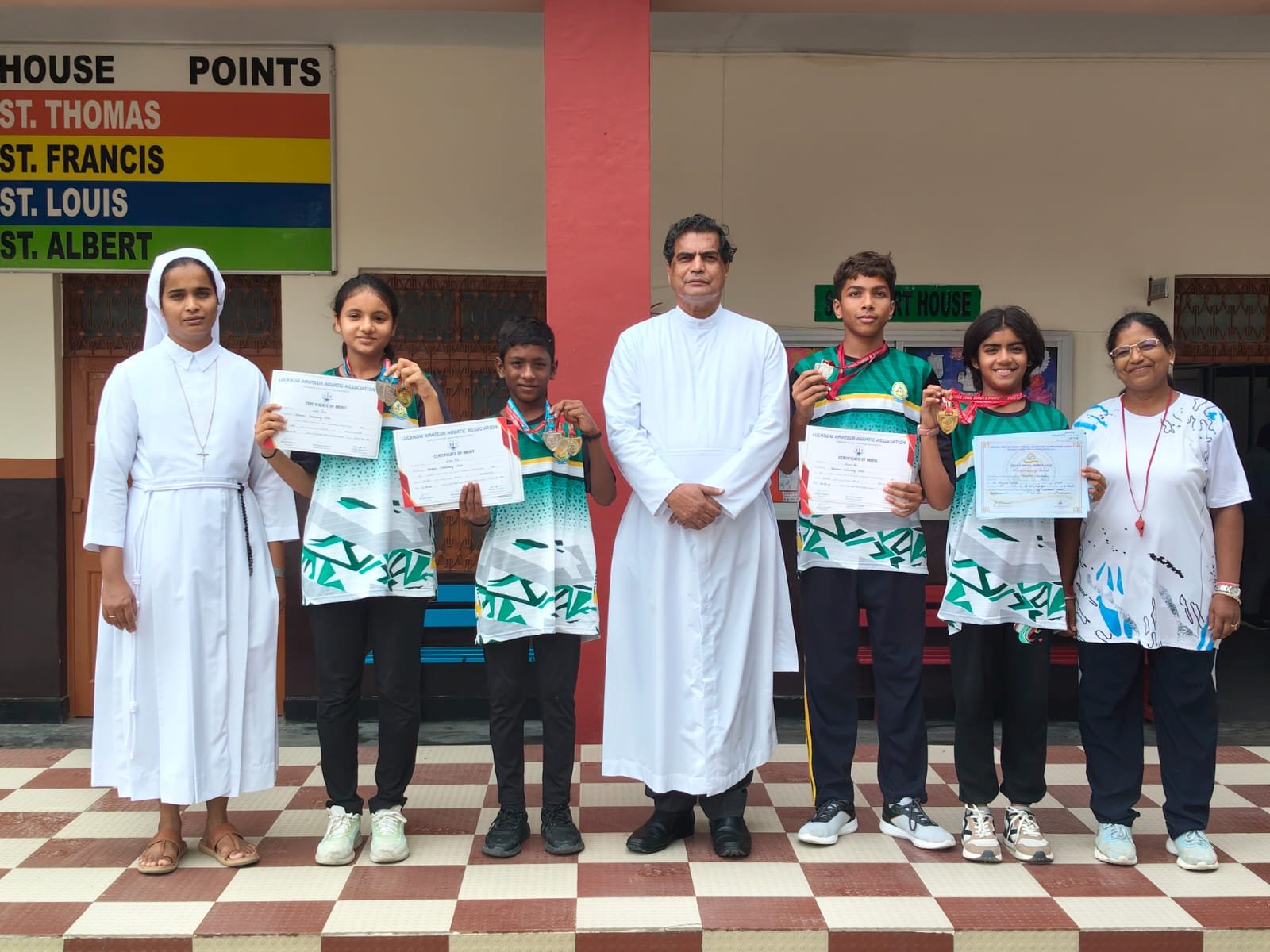 Swimming & Winning team of St. Thomas College